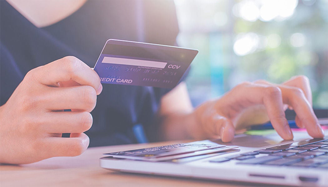 Woman using credit card