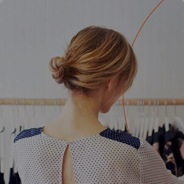 blonde woman looking for clothes