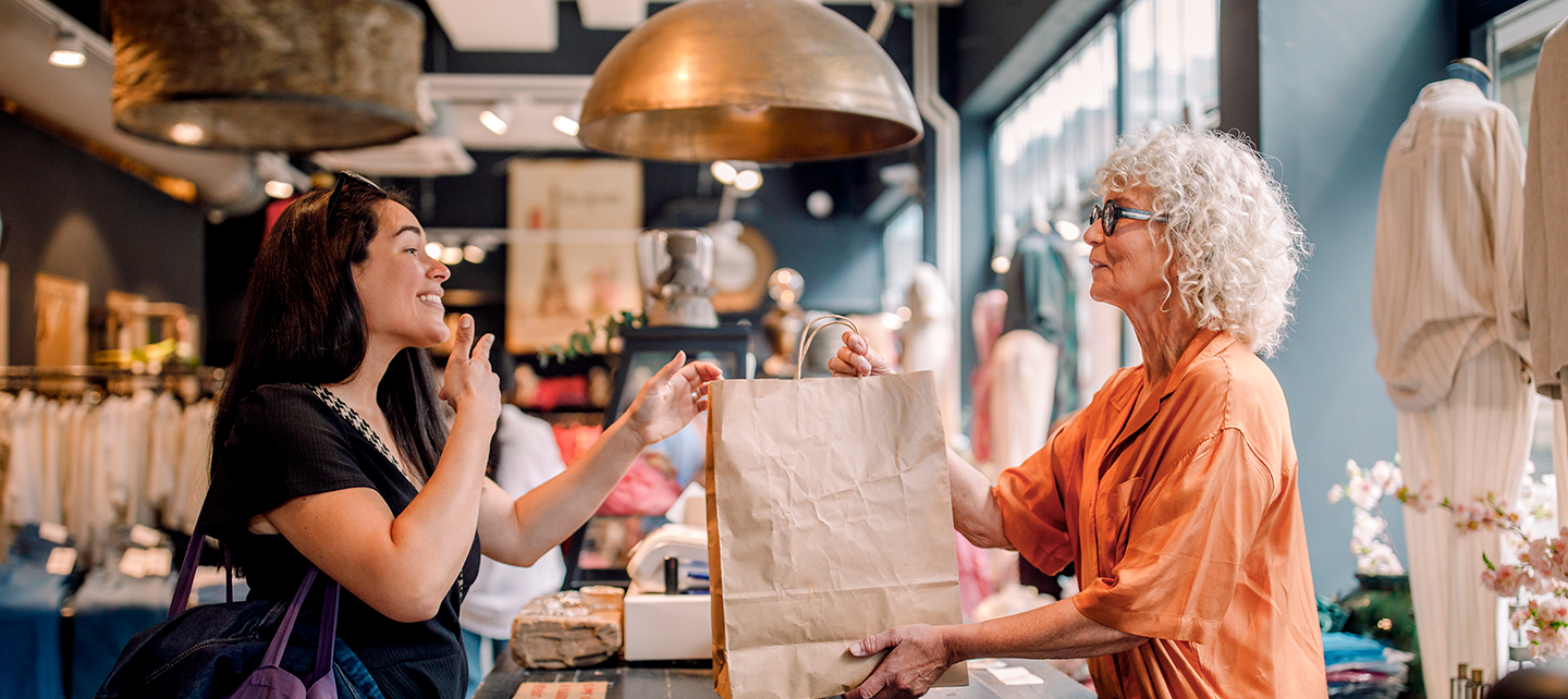 Woman shopping making a purchase at a retail store