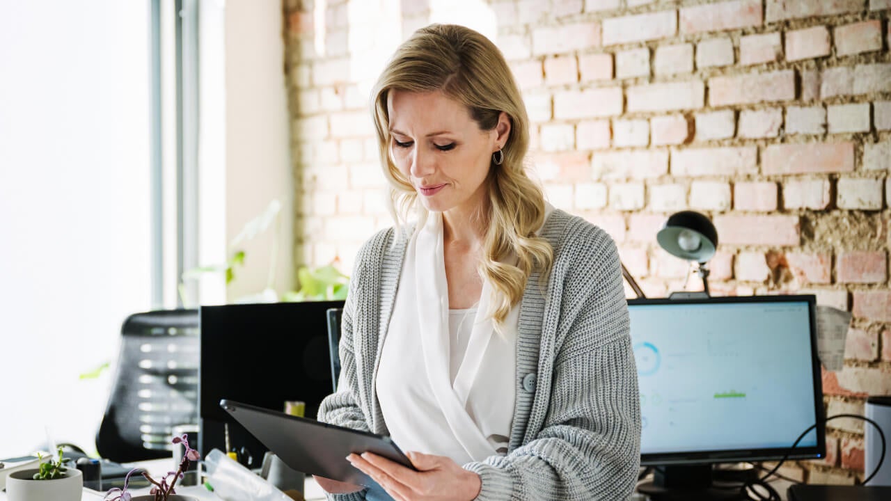 A woman working on tablet