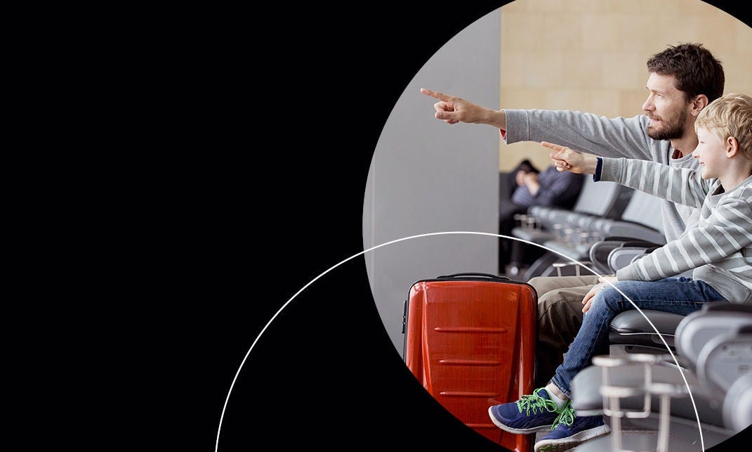 man with kid at airport