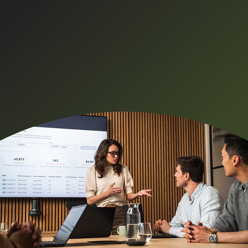 Woman giving presentation to coworkers