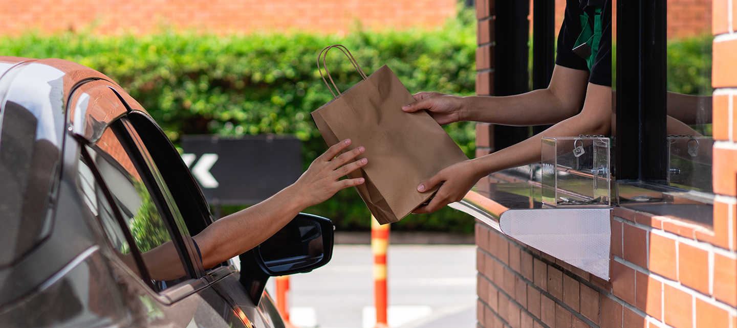 Someone getting their drive thru order