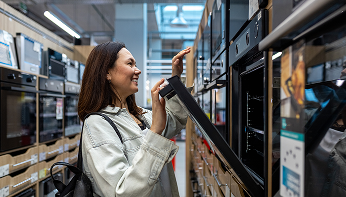 Woman shopping at a home appliance store