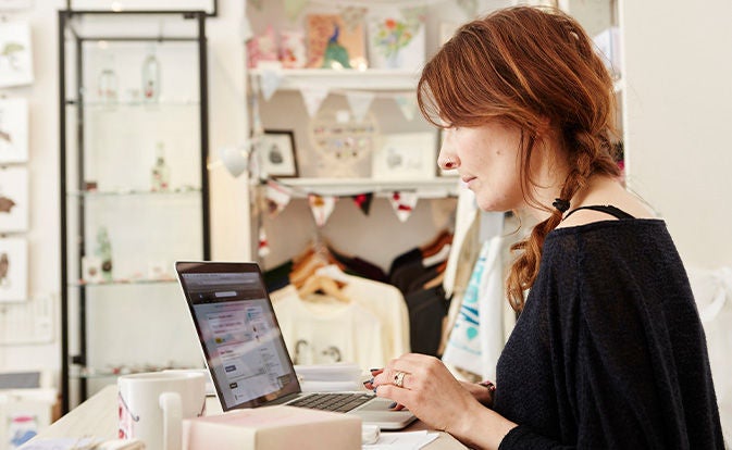 Woman using laptop