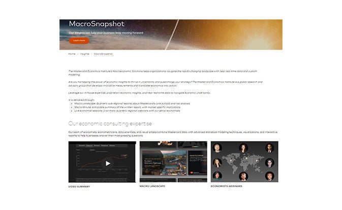 Woman looks over cloudscape from Mountain