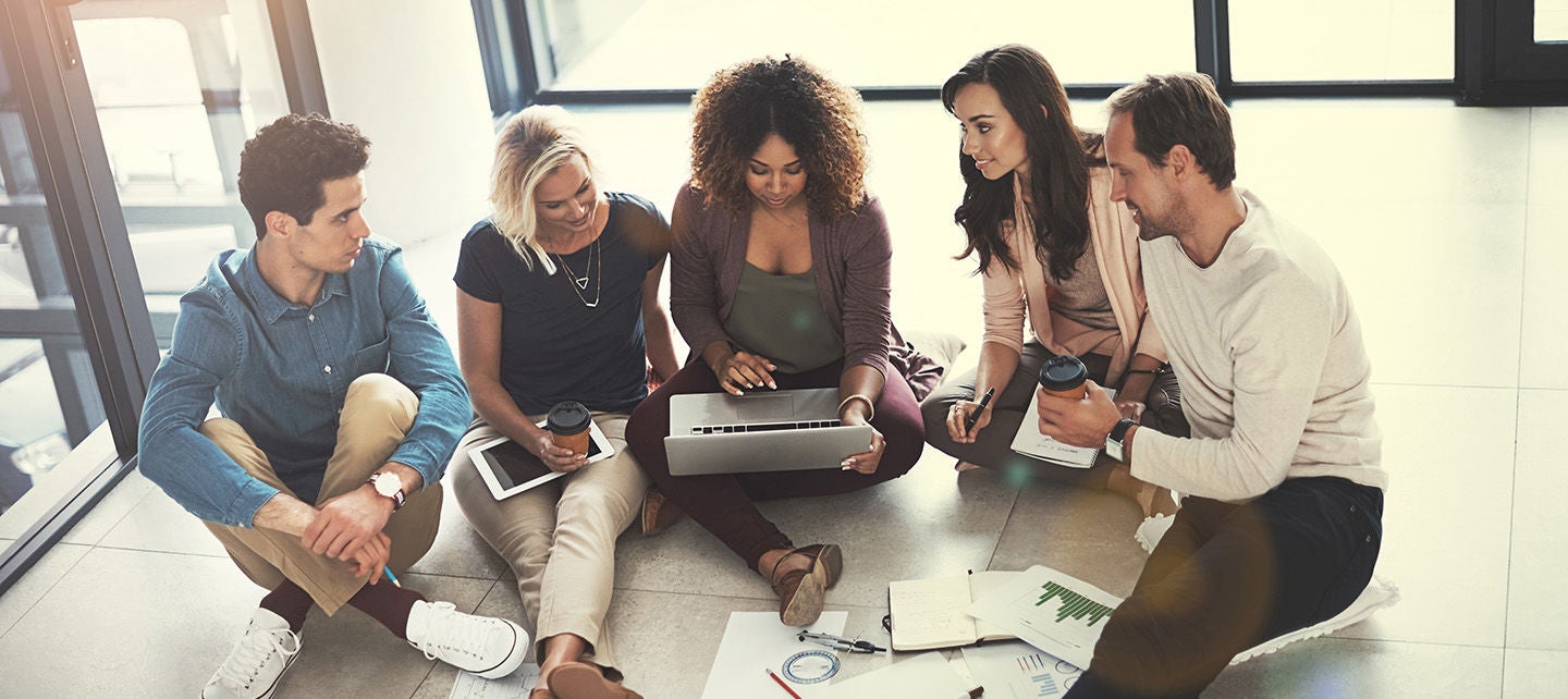 People having a meeting on the floor
