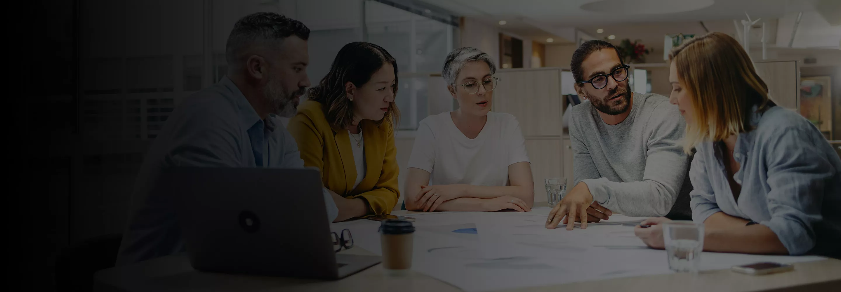 Businesswoman using a phone at workplace