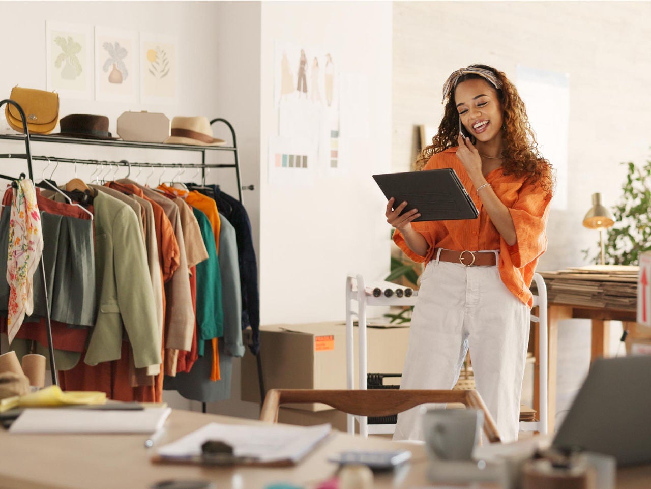 Woman smiling at tablet