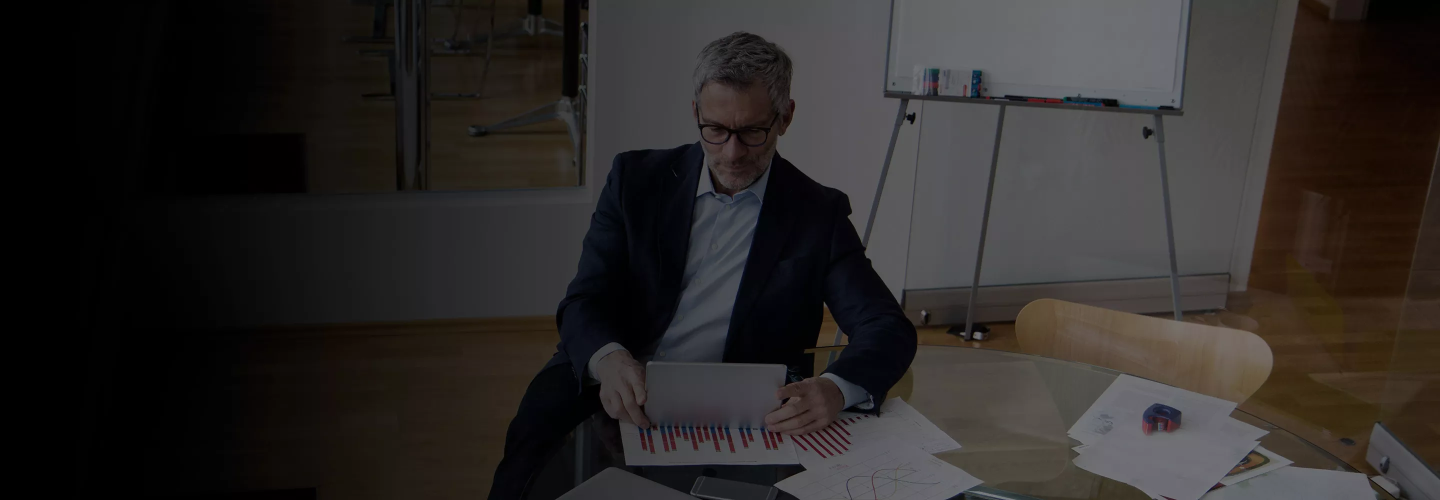 Man looking at tablet