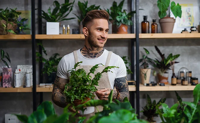 A modern building with multiple windows and a large glass facade.