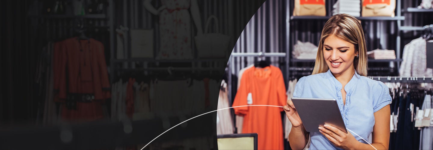 Smiling woman using digital tablet