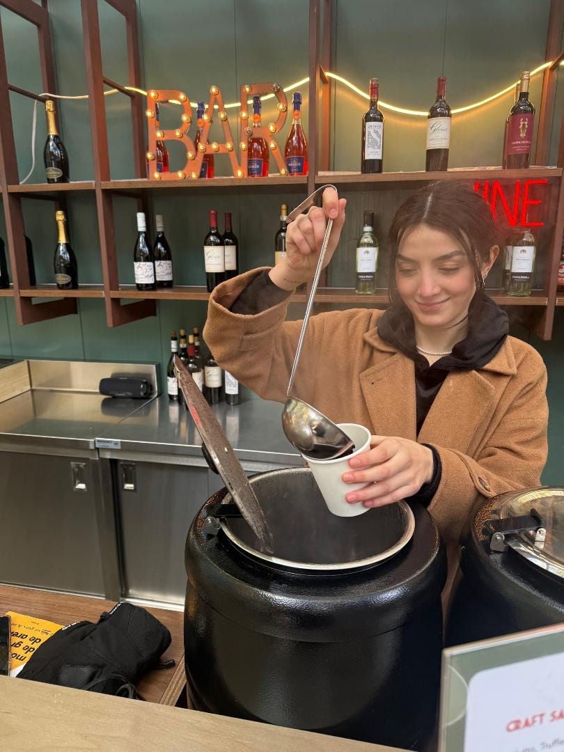 Ana Hernandez serving mulled wine, Bryant Park