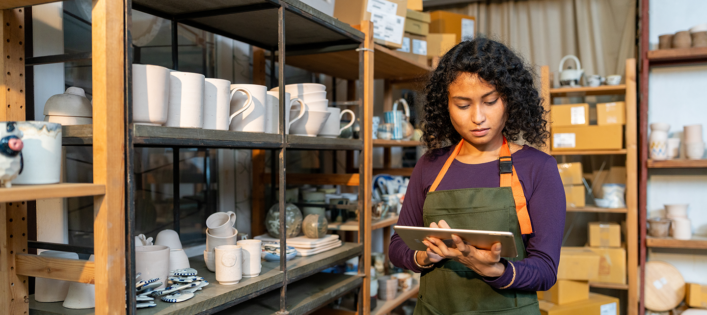 Business owner reviewing customer data