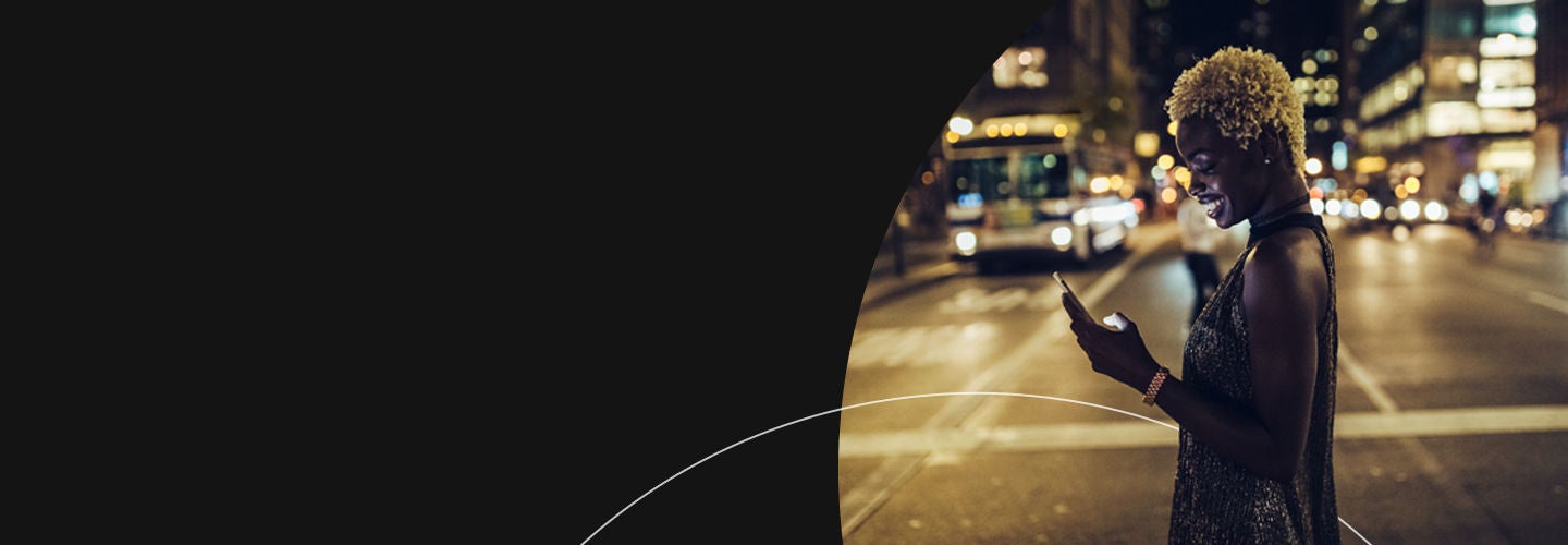 Woman using a large touch screen in a boutique clothing store