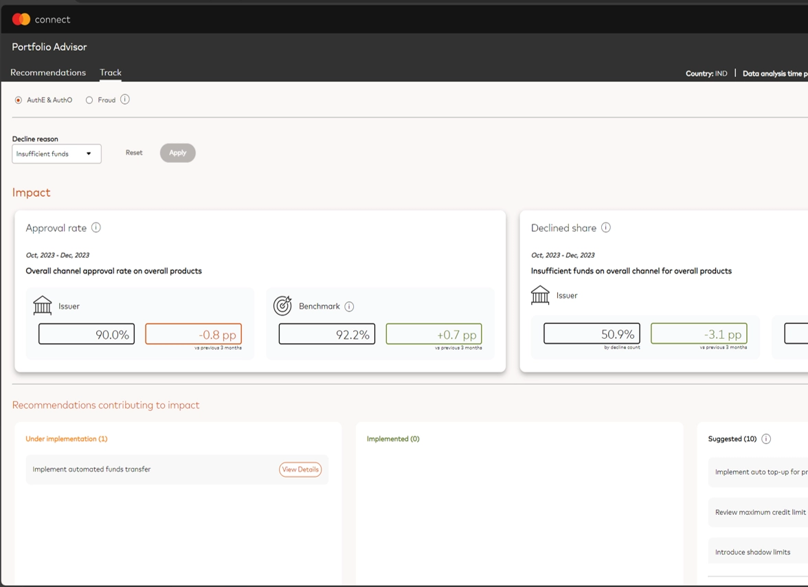 A woman holding a tablet and smiling