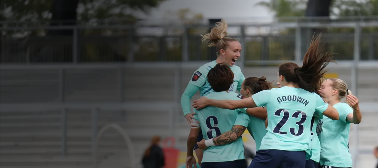 Women in sport team celebrating