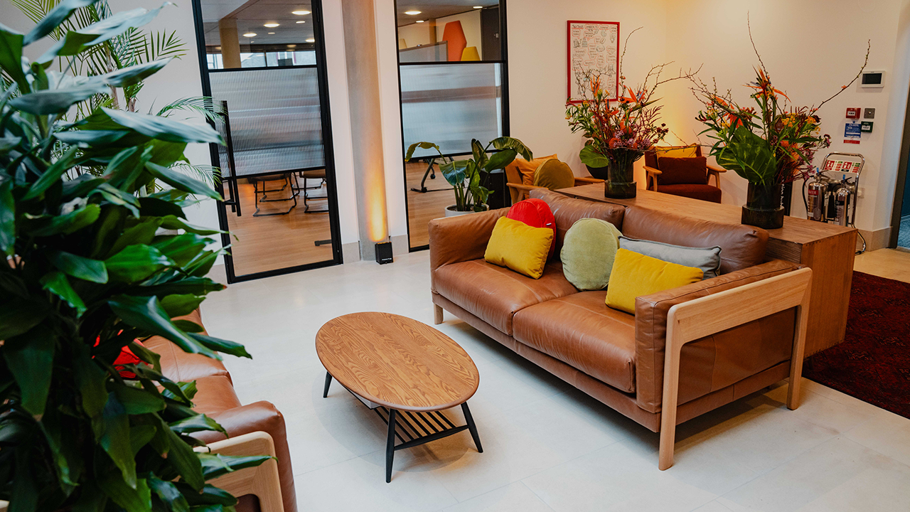 Brown couch in office space