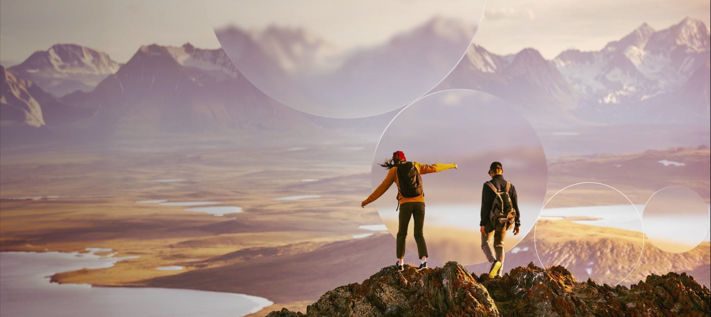 couple standing on top of a mountain