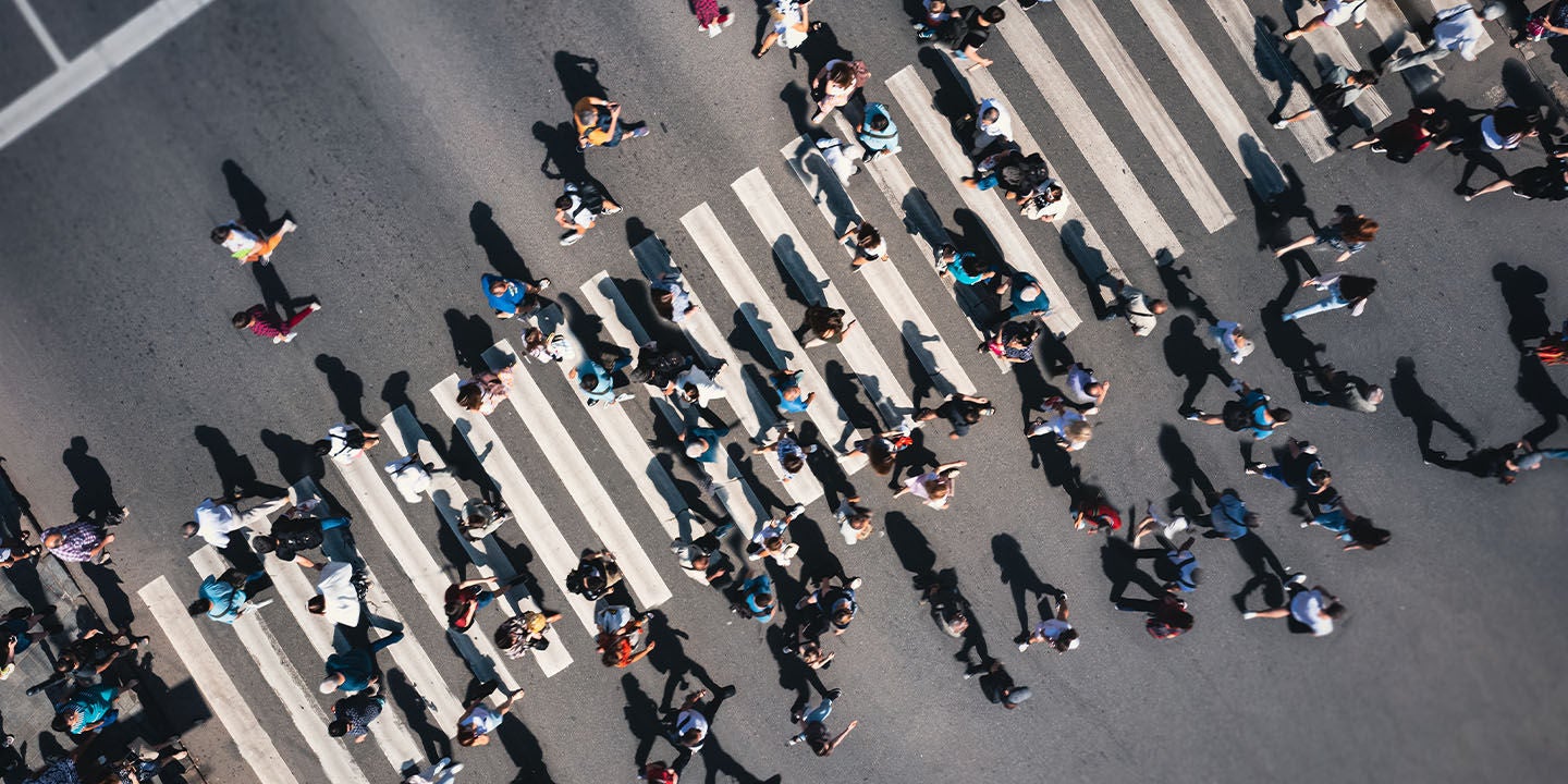 Group of people crossing the street