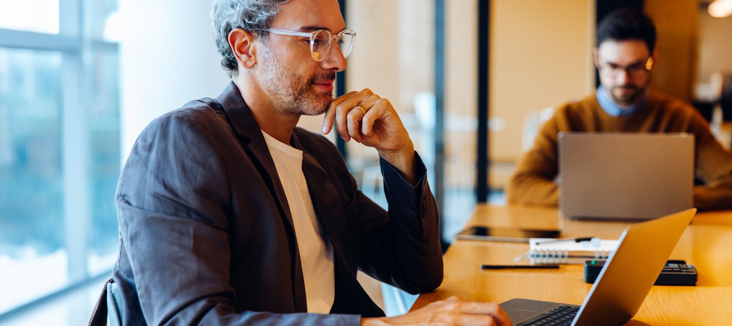 Man doing work in a conference room