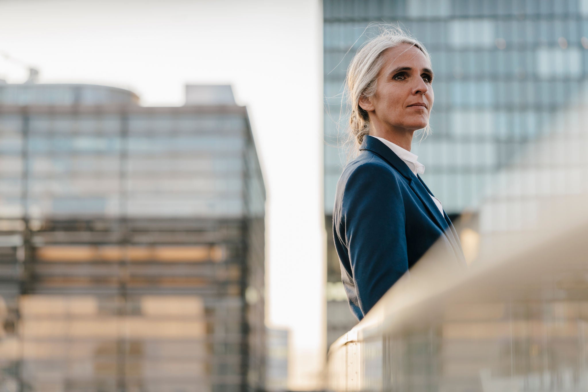 Woman on roof of business building