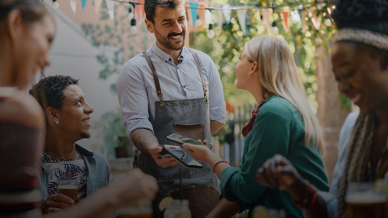Customer paying contactless with mobile. 