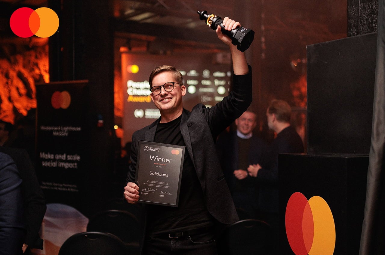 softloans winner excited with trophy