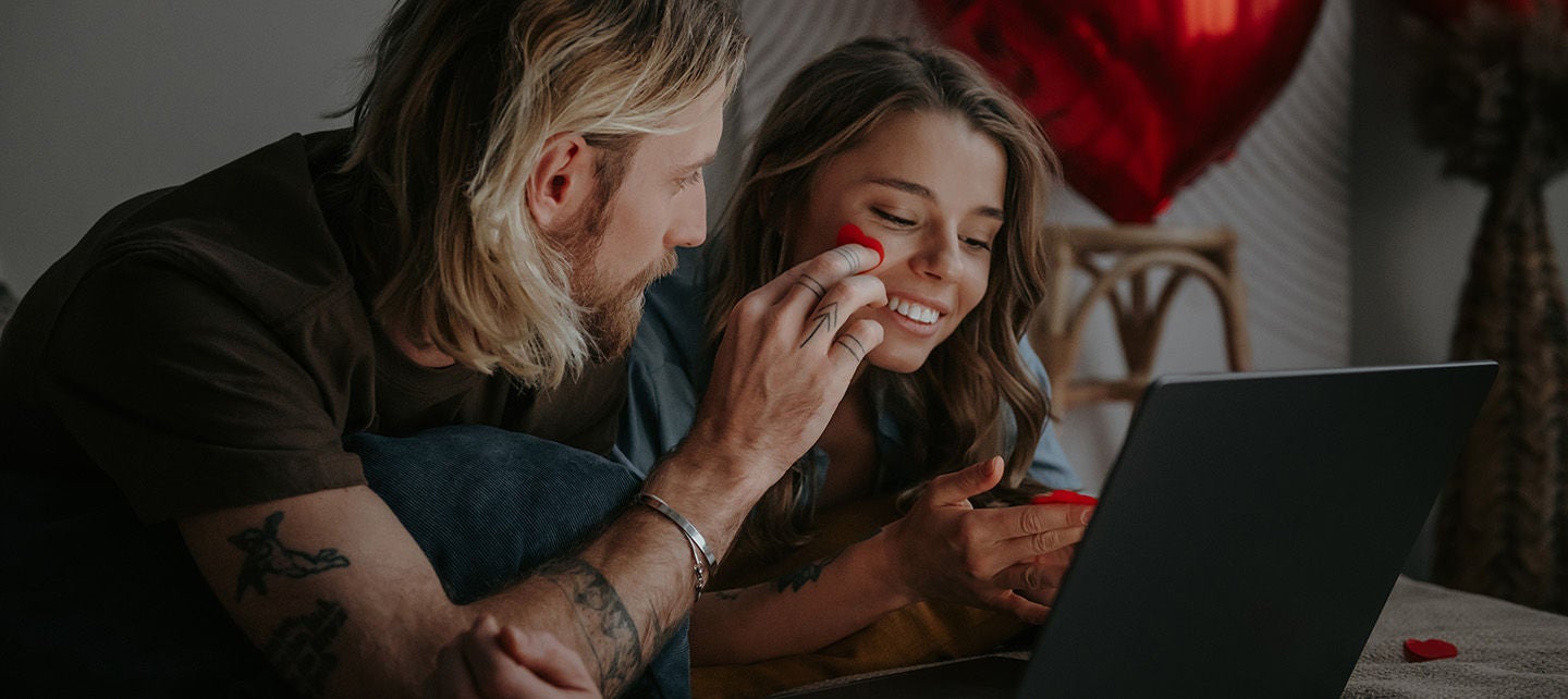 Couple shopping online for Valentine's Day