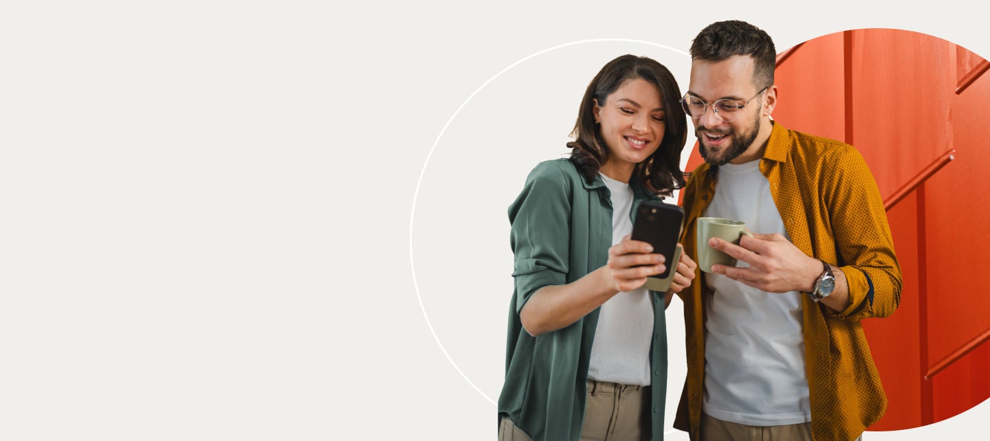 Couple looking at their phone