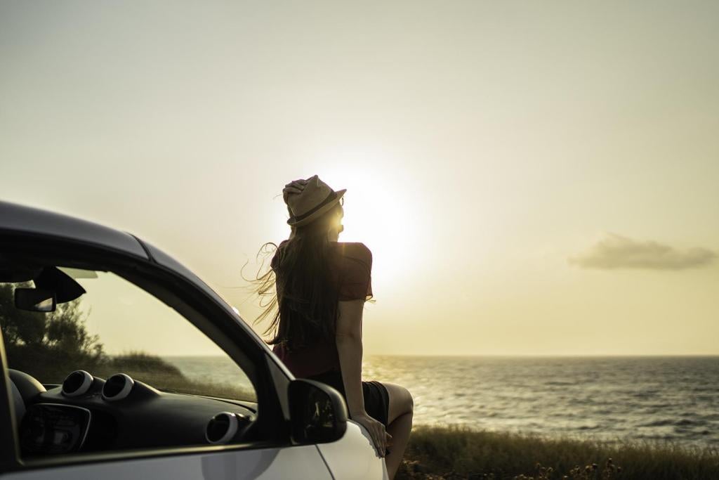 Rentalcars Auto und Sonnenuntergang
