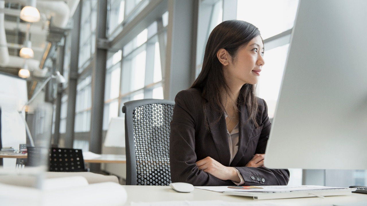 Business woman looking out of the window