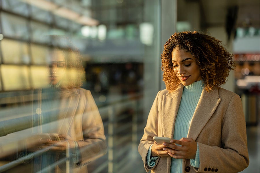 Group of people smiling and working