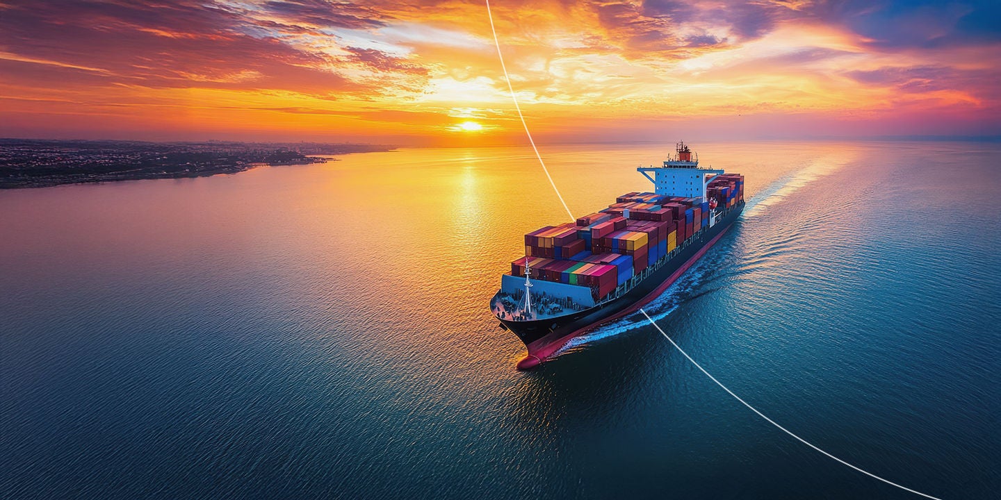 Large cargo ship transports goods over waterway.