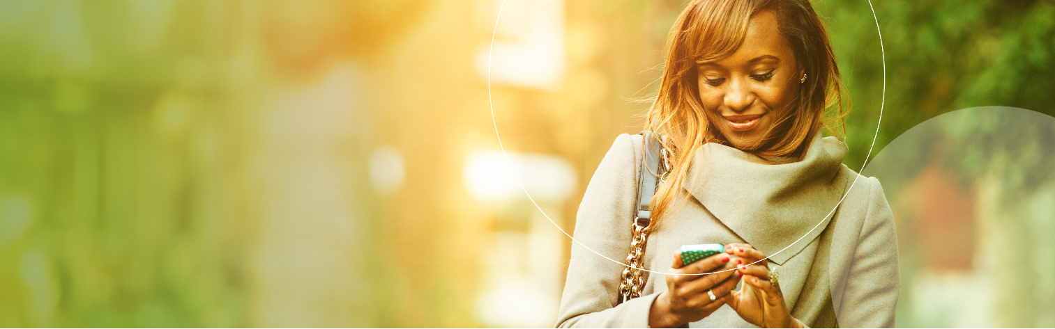 Woman on her phone outside