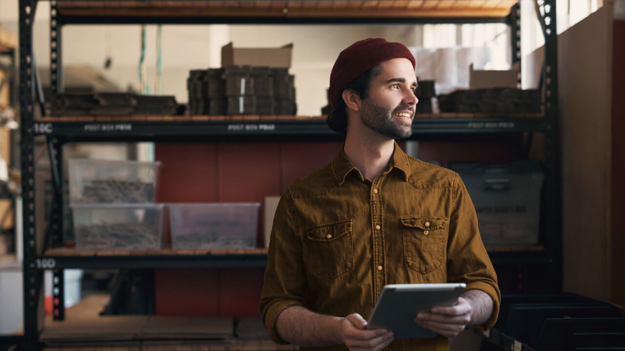 warehouse worker using tablet