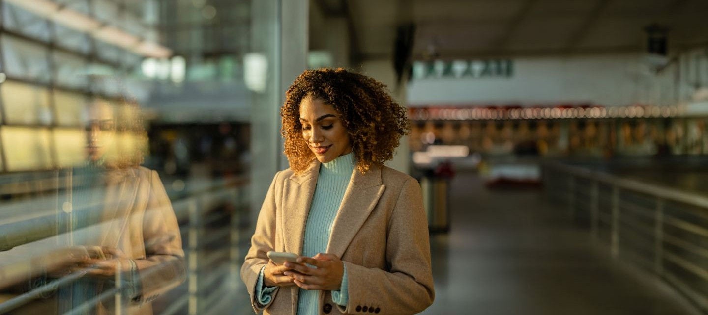 Woman on her phone in the store
