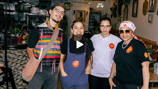 group of people in a restaurant standing