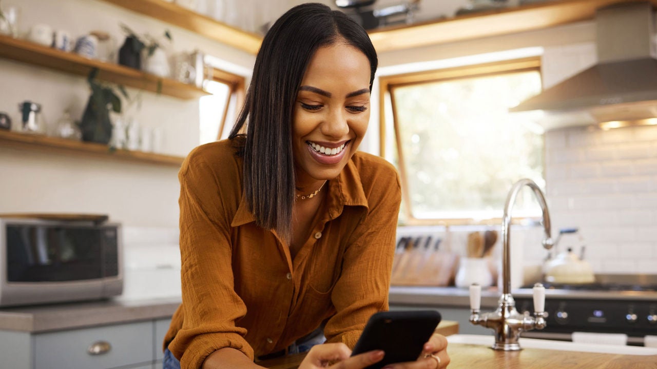 Woman smiling in kitchen
