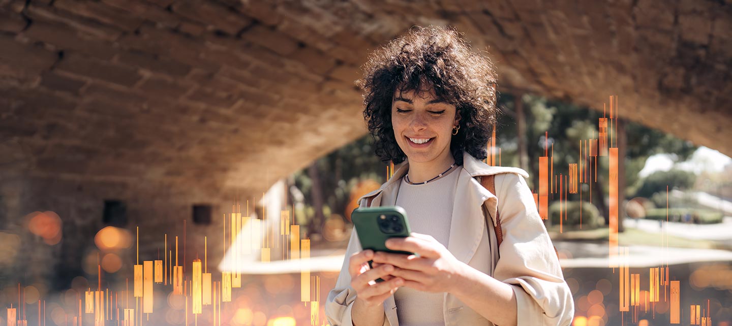 Woman outside looking at her phone