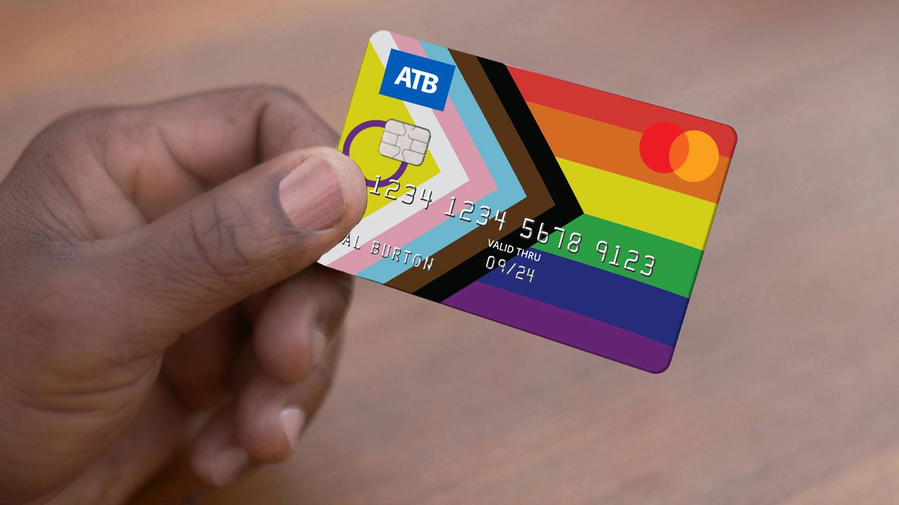 Holding ATB True Name card.