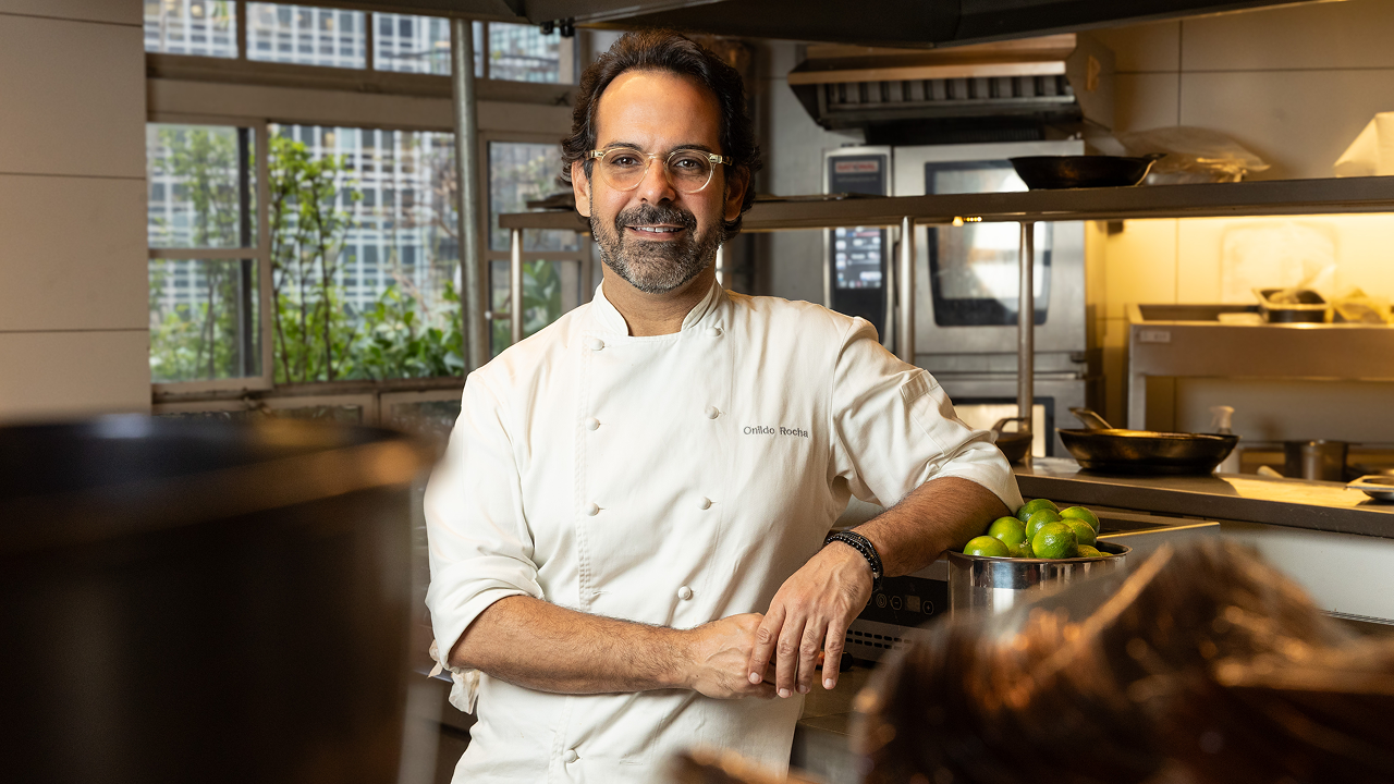Father and son checking a tablet.