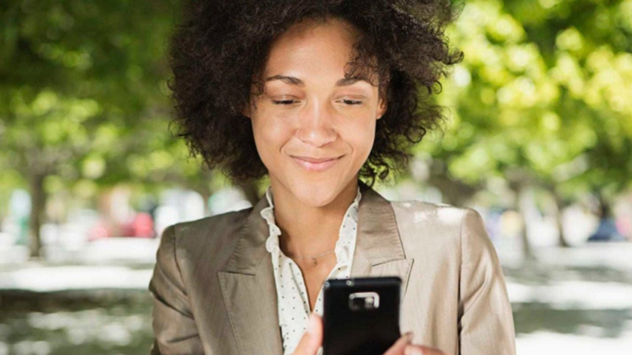 happy woman smiling on phone