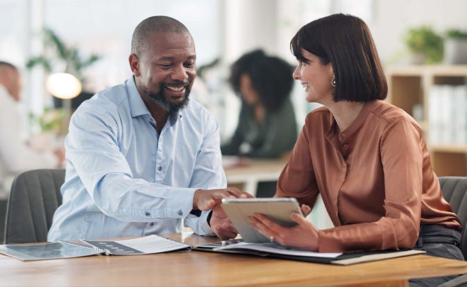 Man offering support to a woman