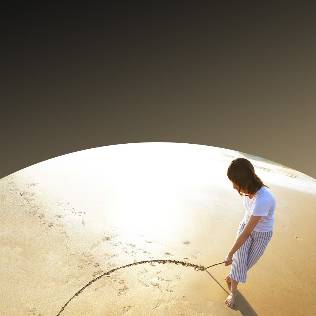 drawing an image in the sand