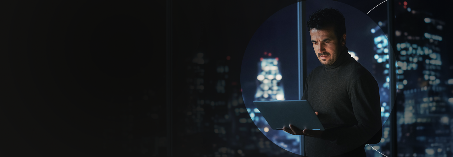 Man on tablet with a dark skyline behind him