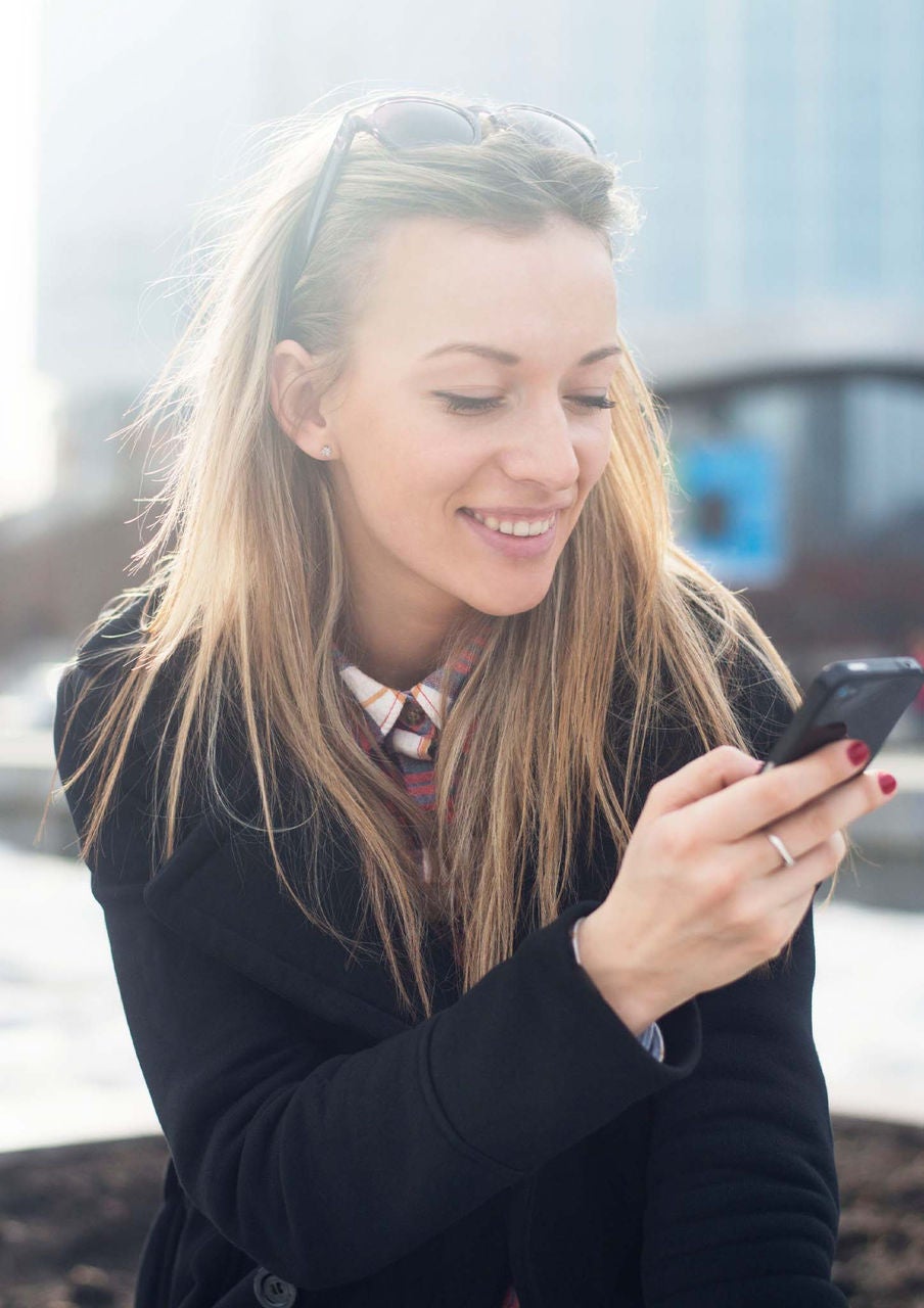 Woman texting on her phone