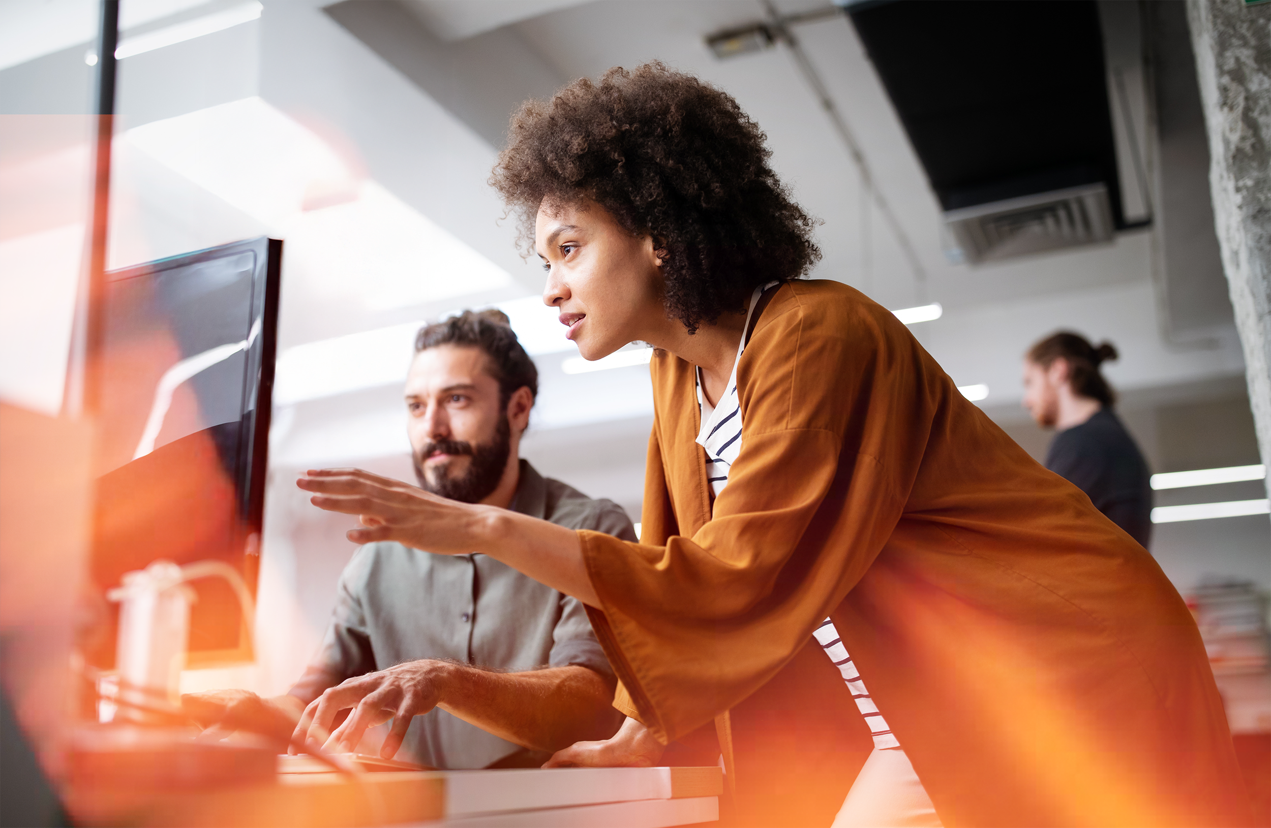Two employees working in office.