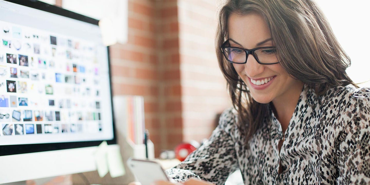 Female industrial designer working in office