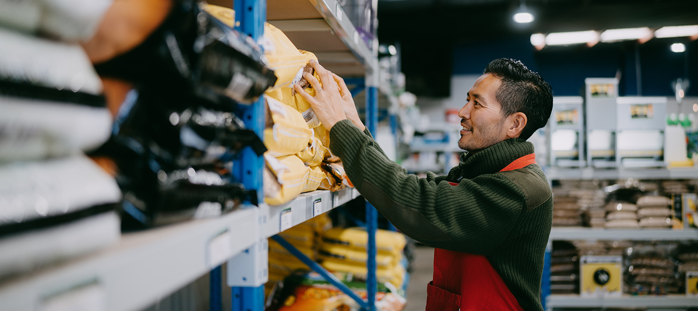 Man stocking at a local retail store